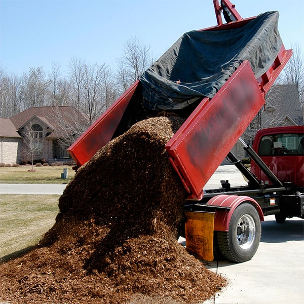 the cost of mulch delivery for a standard size residential property varies based on the amount of mulch needed